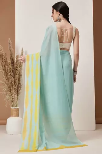 Teal plain cotton blend festive saree with blouse piece