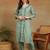 Women green ethnic motifs embroidered cotton front slit chikankari kurta with trousers