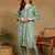 Women green ethnic motifs embroidered cotton front slit chikankari kurta with trousers
