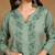 Women green ethnic motifs embroidered cotton front slit chikankari kurta with trousers
