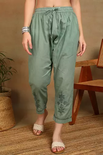 Women green ethnic motifs embroidered cotton front slit chikankari kurta with trousers