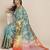 Teal floral printed tissue party wear saree with blouse piece