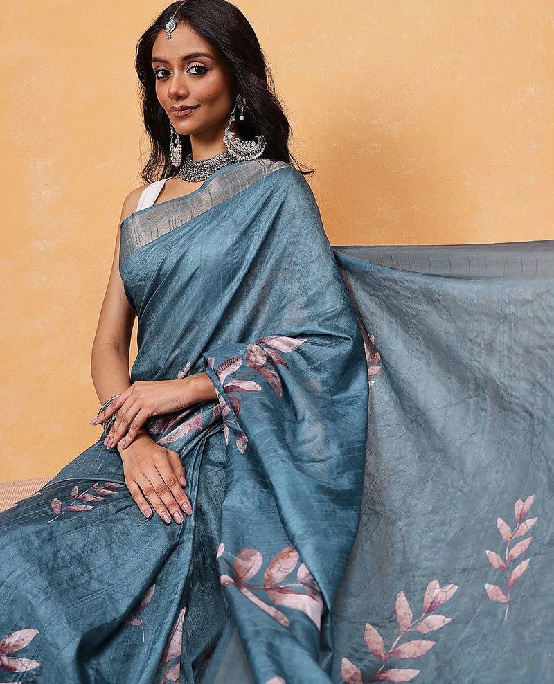 Teal woven silk blend ethnic saree with blouse piece