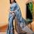 Teal woven silk blend ethnic saree with blouse piece