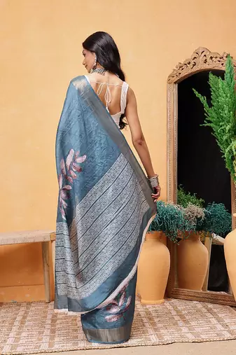 Teal woven silk blend ethnic saree with blouse piece