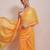 Mustard printed cotton blend ethnic saree with blouse piece