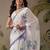 White printed satin party wear saree with blouse piece
