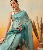 Teal printed organza ethnic saree with blouse piece