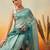 Teal printed organza ethnic saree with blouse piece