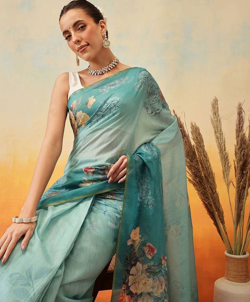 Teal printed organza ethnic saree with blouse piece