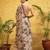 Beige printed silk cotton ethnic saree with blouse piece