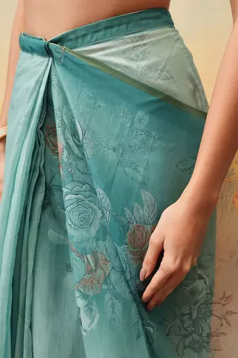 Teal printed organza ethnic saree with blouse piece