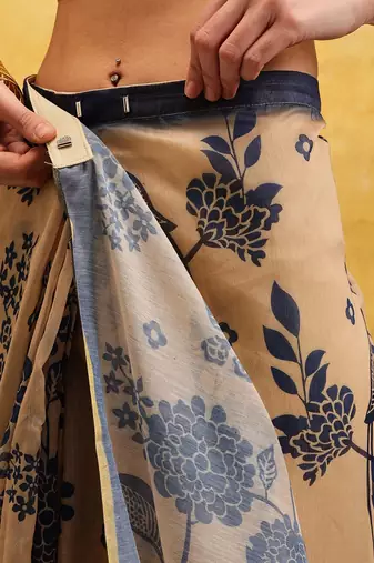 Beige printed silk cotton ethnic saree with blouse piece