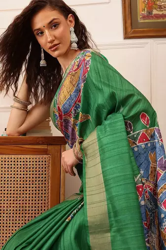 Green printed silk blend ethnic saree with blouse piece