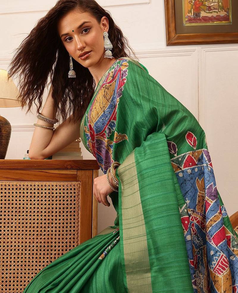 Green printed silk blend ethnic saree with blouse piece