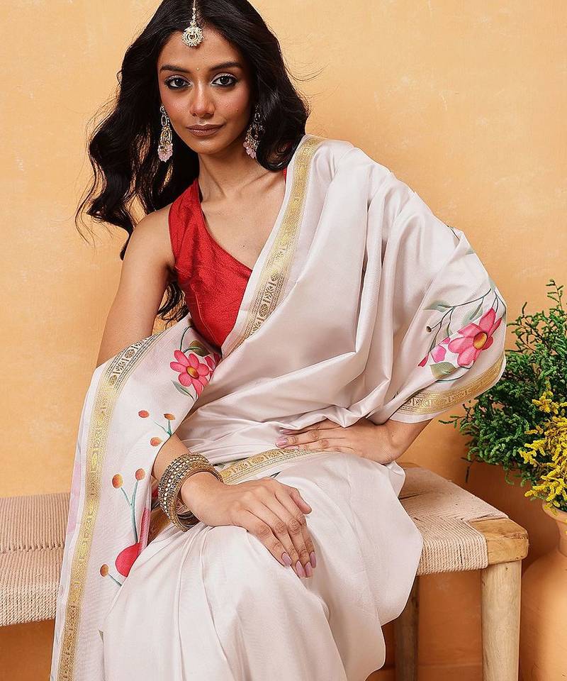 Off white printed silk blend ethnic saree with blouse piece