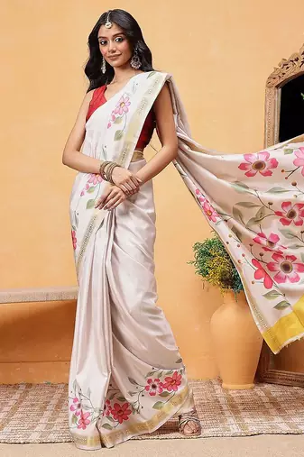 Off white printed silk blend ethnic saree with blouse piece