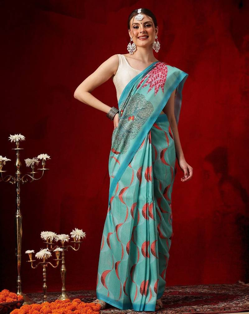 Teal printed cotton blend ethnic saree with blouse piece
