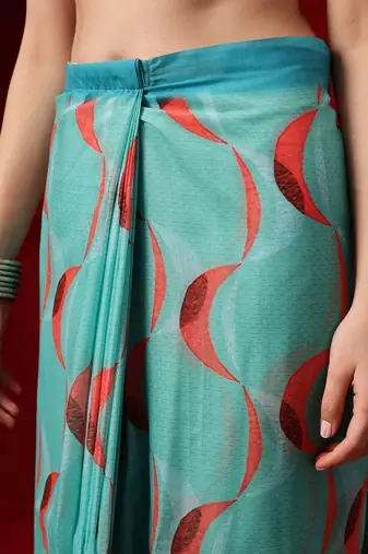 Teal printed cotton blend ethnic saree with blouse piece