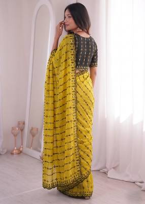 Stunning yellow viscose rangoli silk saree with black embroidery and mirror work 3