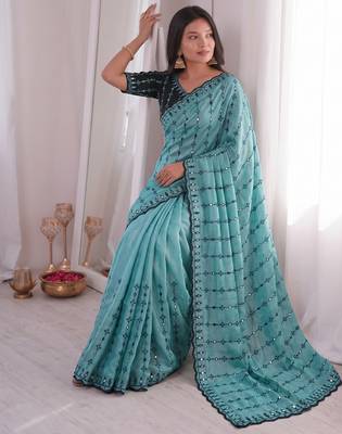 Stunning turquoise viscose rangoli silk saree with black embroidery and mirror work 5