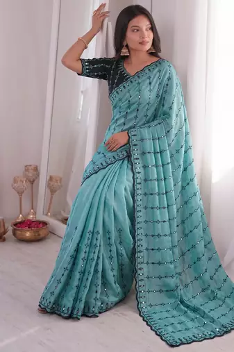 Stunning turquoise viscose rangoli silk saree with black embroidery and mirror work