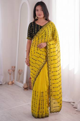 Stunning yellow viscose rangoli silk saree with black embroidery and mirror work
