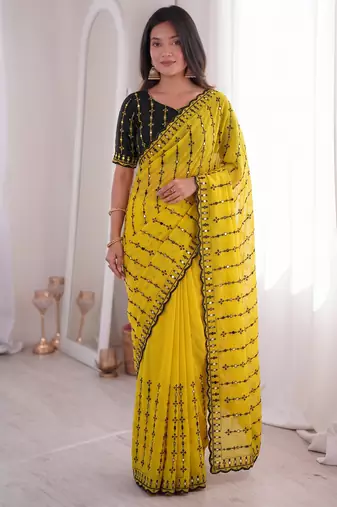 Stunning yellow viscose rangoli silk saree with black embroidery and mirror work