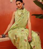 Green woven cotton blend traditional saree with blouse piece
