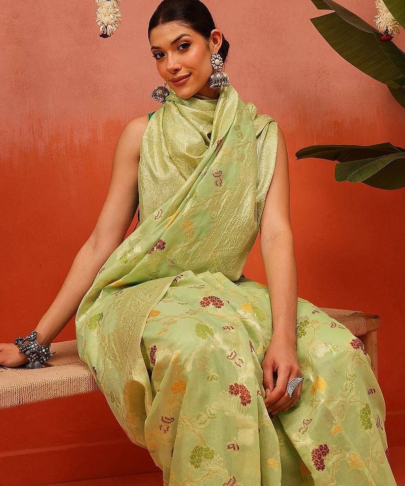 Green woven cotton blend traditional saree with blouse piece
