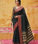 the midnight luxurious black soft silk blend saree with magenta & gold zari border
