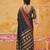 the midnight luxurious black soft silk blend saree with magenta & gold zari border