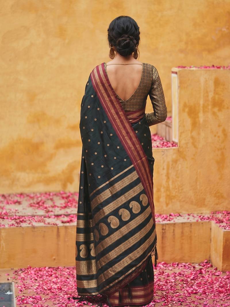 the midnight luxurious black soft silk blend saree with magenta & gold zari border
