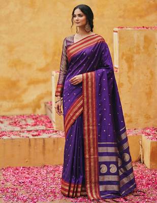 the majestic amethyst: royal blue soft silk blend saree with contrast red zari border 1