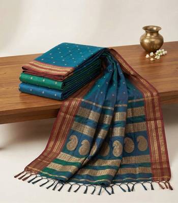 the peacock hue: teal blue soft silk blend saree with contrast red zari border 4