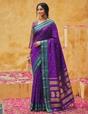 the violet soft silk blend saree with contrast green zari border 1
