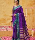 the violet soft silk blend saree with contrast green zari border