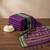 the violet soft silk blend saree with contrast green zari border