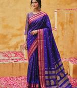 the blue soft silk blend saree with contrast red zari border