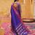 the blue soft silk blend saree with contrast red zari border