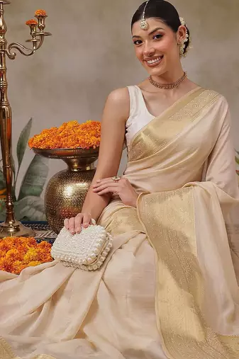 Beige plain silk blend ethnic saree with blouse piece