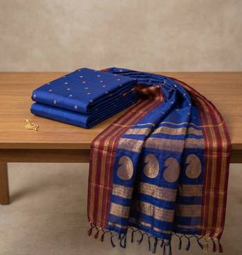 the blue soft silk blend saree with contrast red zari border 4