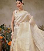 Beige woven silk blend ethnic saree with blouse piece