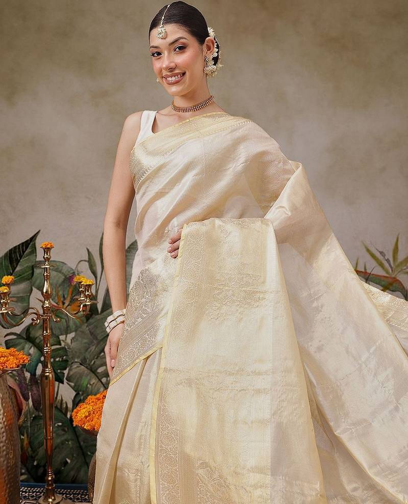Beige woven silk blend ethnic saree with blouse piece