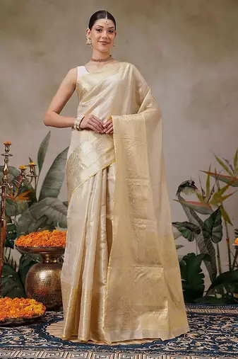 Beige woven silk blend ethnic saree with blouse piece
