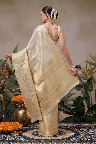 Beige woven silk blend ethnic saree with blouse piece