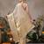 Beige woven silk blend ethnic saree with blouse piece
