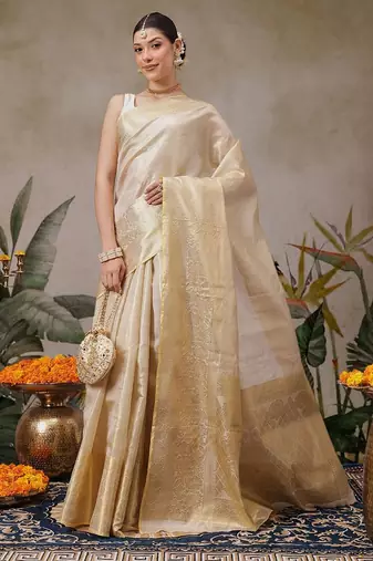 Beige woven silk blend ethnic saree with blouse piece