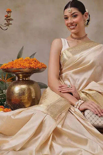 Beige plain silk blend ethnic saree with blouse piece