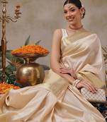 Beige plain silk blend ethnic saree with blouse piece